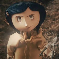 an animated doll holding a pair of scissors