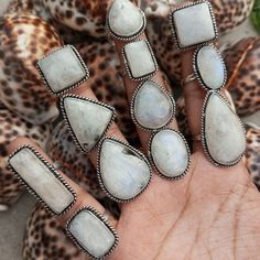 Elevate your fashion game with this set of 10 dainty and alluring boho style rings, each embedded with a natural moonstone in different shapes! Perfect for any occasion from Christmas to engagement, these handmade and customizable rings are available in US sizes 6 to 10. Stack them up or mix and match, the possibilities are endless! #moonstone #bohojewelry #alluringrings #handmade #fashion #jewelry #naturalstones #stackablerings #womenfashion #love #healing #nature 🌙✨🌸  #eBay #eBayStore Bohemian Stackable Jewelry For Festivals, Bohemian Stackable Summer Jewelry, Bohemian White Moonstone Ring With Natural Stones, Bohemian Moonstone Crystal Ring With Gemstone, Bohemian Adjustable Stackable Moonstone Ring, Bohemian Midi Rings Nickel-free For Jewelry Making, Handmade Bohemian Moonstone Crystal Ring, Adjustable Stackable Bohemian Moonstone Ring, Bohemian Midi Rings For Jewelry Making