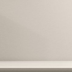 an apple sitting on top of a white counter