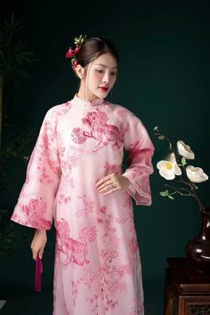 "🌿 This set includes traditional Ao Dai, red pants. Style: Traditional Material: Very well made with high-quality double layers Collar: traditional collar Please provide bust-waist-and hip measurements when placing your order to ensure the best fit for you. 🌿 NOTE: * Recommend gentle washing * Please contact us for any inquiries about size. We don't have an exchange policy for the wrong size * It is safe for a washer and dryer in a \"delicate\" setting. * Actual Ao Dai colors may differ up to 10% due to lightning and viewing devices. * These ao dai pants are made based on Vietnamese size; they will run smaller than American size. *3D printed ao dai: you may see some white broken fabric around the seam (collar). *There might be some chalk/ pen writings on the fabric because it is brand ne Luxury Embroidered Ao Dai For Party, Bridesmaid Ao Dai, Ao Dai Red, Lace Ao Dai, Bridal Ao Dai, Wedding Ao Dai, Vietnam Costume, Modern Ao Dai, Blouse Size Chart