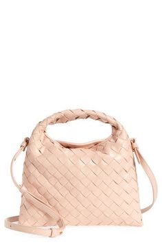 This slightly slouchy hobo bag in a scaled-down silhouette for just the essentials is handwoven in the label's iconic Intrecciato style from soft calfskin. Magnetic closure Top carry handle; removable, adjustable crossbody strap Interior zip pocket Calfskin-leather lining Leather Made in Italy Designer Handbags Modern Hobo Shoulder Bag With Braided Handles, Chic Hobo Bag With Braided Handles, Modern Woven Leather Hobo Bag For Daily Use, Modern Bags With Intrecciato Weave For Errands, Daily Use Double Handle Hobo Bag With Intrecciato Weave, Modern Intrecciato Weave Bag For Errands, Chic Hobo Bag With Intrecciato Weave, Chic Hobo Bag With Intrecciato Weave For Shopping, Modern Bucket Bag With Intrecciato Weave For Everyday