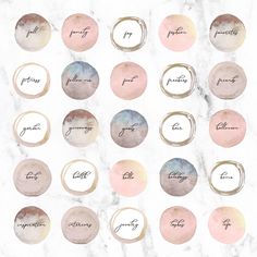 the words are written in different colors and sizes on marble with pink, blue, green, yellow, and white circles