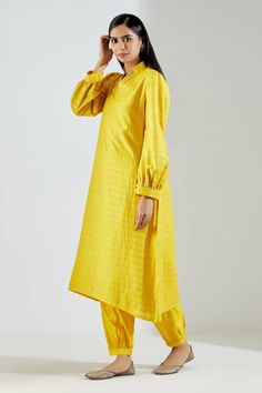 Yellow straight long kurta with striped pattern, seam pockets and cuff sleeves. Comes with salwar.
Components:2
Neckline:Stand Collar
Sleeve Length:Full
Fabric:Chanderi
Color:Yellow
Cuff sleeves
Seam pocket
Striped pattern - Aza Fashions Striped Kurta, Embroidery Stand, Chanderi Dupatta, Long Kurta, Kurta Set For Women, Kurta Set, Set For Women, Cuff Sleeves, Aza Fashion