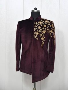 a purple jacket with gold embroidered flowers on it