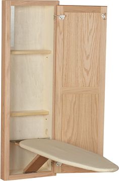 an open wooden cabinet with a surfboard in it