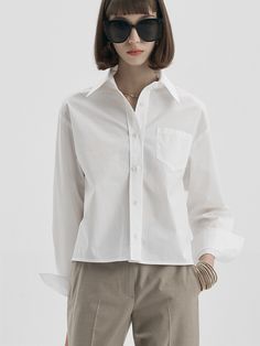 Editor's NotesMaLoupe's 4105 cropped pocket shirt with a soft texture and unique mood of MaLoupe. The shirt is comfortable and perfect for classic outfits.- 4105 cropped pocket shirt  - Oversized shirt with a cropped length- Pocket detail on the chest- Logo embroidery detail- Creates a semi casual moodMeasurements (inch)- Length: 21.6 inch- Shoulder: 18.5 inch- Chest: 21.6 inch- Sleeve: 22 inch*Model info: height 5'6 / waist 24 / fitting size FreeComposition & Care- 56% C Classic Cropped Shirt With Pockets For Work, Classic Collared Cropped Shirt With Pockets, White Relaxed Fit Cropped Button-up Shirt, White Collared Cropped Shirt For Work, White Collared Blouse With Pockets, Relaxed Fit Collared Cropped Shirt With Pockets, Collared Cropped Shirt With Pockets Relaxed Fit, White Relaxed Fit Blouse With Pockets, White Shirt With Pockets And Spread Collar