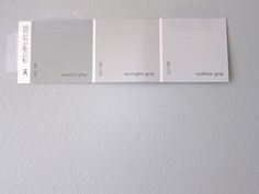 three different shades of white paint on a wall with the same color swatches for each one