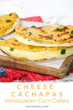 three quesadillas sitting on top of a cutting board next to each other