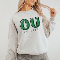 The perfect sweatshirt for any Ohio University Bobcat! Show off your OU pride with this cute and comfy sweatshirt! It comes in a variety of sizes and colors so you can find the perfect fit for you. Go Bobcats!  - 50% cotton, 50% polyester - Medium-heavy fabric (8.0 oz/yd² (271.25 g/m²) - Loose fit - Sewn-in label - Runs true to size Care Instructions: Machine wash: warm (max 40C or 105F); Non-chlorine: bleach as needed; Tumble dry: medium heat; Do not iron; Do not dryclean. PLEASE READ BEFORE OR Casual Green Sweatshirt For Game Day, Ohio Bobcats, Athens Ohio, University Crewneck, College Apparel, Ohio University, Oh Yeah, Comfy Sweatshirt, Lynx