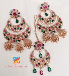 American Diamond (AD) Multicolored Earrings Tikka with small Jhumkis on the bottom. Available to shop online and delivered to your doorsteps anywhere in the world with our Everything-Everywhere FREE Shipping. 📦Unmatched FREE Worldwide Shipping EXPLORE more Maang Tikka Sets and Tikka Set Punjabi AMERICAN DIAMOND JEWELLERY Match with our pretty Single Line Necklaces Jaspreet, Canada ⭐️⭐️⭐️⭐️⭐️ Jewellery is more beautiful in real than the picture. Also, I received order within two days. I like the Multicolor Chandbali Earrings For Eid, Multicolor Chandbali Jhumkas For Diwali, Multicolor Fusion Jhumkas For Diwali, Fusion Style Multicolor Jhumkas For Diwali, Fusion Style Multicolor Jhumkas For Festivals, Diwali Multicolor Chandbali Jhumkas, Diwali Fusion Multicolor Chandbalis, Multicolor Jhumkas With Matching Earrings For Diwali, Multicolor Chandbali Danglers For Diwali