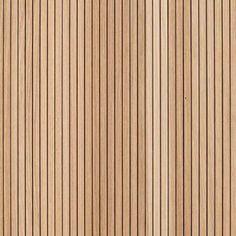 a close up view of the wood grains on a door paneled in light brown