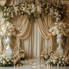 an elegant wedding setup with white flowers and candles