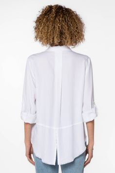 The Riley collared button down shirt features rolled tab sleeves, double chest pockets, a split back tail, and a frayed hem. This shirt is a perfect staple to any wardrobe. Material: 100% Tencel™ Eco-Friendly Machine wash cold Color: White Model is 5'9" and wearing a size S Imported Heart Clothes, Velvet Heart, White Button Up, Button Up Shirt, White Shirt, Chest Pocket, Up Shirt, Button Up Shirts, Split