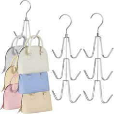 four different colored purses hanging on hooks