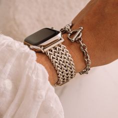 Elevate your style game with the Nova Stainless Band, one of our most feminine apple watch bands. Skillfully made from premium stainless steel, this band transforms your Apple Watch from a simple timepiece into a stunning fashion accessory. Furthermore, its unique design ensures you stand out, adding a touch of sophistication to your everyday look. Additionally, the Nova Stainless Band, one of the most feminine Apple Watch bands available, offers a variety of color choices, including Gold, Rose Gold, Silver, Starlight, and Black. Each color pairs beautifully with an elegant jewelry clasp, enhancing the overall aesthetic. Moreover, the band weighs a mere 80g (2.8 oz) and measures 2cm (0.8") in width. Therefore, it's not only visually appealing but also comfortable for all-day wear. Compatib Apple Bands For Women, Apple Watch Bands Starlight, Dressy Apple Watch Bands Women, Starlight Apple Watch Aesthetic, Apple Watch Aesthetic Bracelets, Apple Watch Style Women, Classy Apple Watch, Feminine Apple Watch Bands, Apple Watch Aesthetic