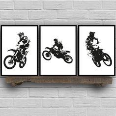 three black and white pictures of dirt bikes on a shelf next to a brick wall