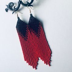 "These black red long bead earrings pair amazingly with any outfit, dressy or casual. They are made of high-quality Czech colored beads with steel . Colors: black red Length: 5.1 inches (13cm) Width: 1 inches (2.5 cm) Materials: Czech \"Preciosa\" beads Durable synthetic thread" Red Tassel Earrings With Fringe And Round Beads, Elegant Red Beaded Earrings With Fringe, Red Fringe Tassel Earrings With Round Beads, Elegant Red Beaded Fringe Earrings, Red Bead Earrings, Native Earrings, Seed Bead Jewelry Patterns, Bead Loom Designs, Beaded Earrings Diy