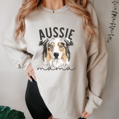 Australian Shepherd Mom Sweatshirt, Aussie Shepherd Mama Crewneck Gift, Blue Merle Aussie Dog Mom Jumper, Australian Shepherd Gifts  * 50% cotton, 50% polyester * Pre-shrunk * Classic fit * 1x1 athletic rib knit collar with spandex * Air-jet spun yarn with a soft feel and reduced pilling * Double-needle stitched collar, shoulders, armholes, cuffs, and hem This product is made especially for you as soon as you place an order, which is why it takes us a bit longer to deliver it to you. SIZING: Alt Long Sleeve Cotton T-shirt With Dog Print, Cotton Long Sleeve T-shirt With Dog Print, Cotton Crew Neck Top With Dog Print, Blue Merle Aussie, Aussie Dog, Mama Crewneck, Aussie Shepherd, Aussie Dogs, Womens Hoodies