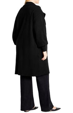 A versatile layering piece, this cozy longline cardigan keeps your look on trend with a notched collar and billowy balloon sleeves. 42 1/2" length Open front Notched collar Long sleeves Viscose/nylon/polyester Machine wash, dry flat Imported V-neck Outerwear For Daywear In Fall, Solid Open Front Sweater Coat For Work, Versatile Long Outerwear For Work, Black Puff Sleeve Outerwear For Fall, Oversized V-neck Sweater Coat For Workwear, Fall Daywear Open Front Outerwear, Chic Puff Sleeve Winter Outerwear, Chic Puff Sleeve Outerwear For Winter, Chic Winter Outerwear With Puff Sleeves