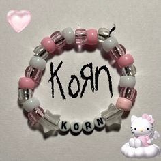 #pink #korn #band #music #plur #emo #kandi #bracelet #ponybead Single Ideas Kandi, Random Bracelet Ideas, Cute Kandi Bracelet Ideas, Kandi Heart Pattern, Beaded Bracelets Kandi, Gir Kandi Bracelet, Cool Bracelet Ideas With String, Kandi Rosary, Rock Band Bracelets