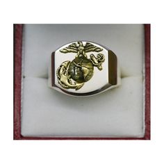 "Beautiful Two Tone Marine Corps Signet Ring with a 14K Gold Eagle Globe and Anchor - Made in the USA Continuum Sterling Silver with a solid 14K Yellow Gold Eagle Globe and Anchor. The Ring face is approx 3/4\" tall (20mm) with a 16mm tall Eagle Globe and Anchor. Continuum Sterling Silver (a Silver/Palladium Alloy) has a hardness of 150 on the Vickers hardness scale, while normal Sterling Silver is 75. Higher the number, the more durable. Google: Stuller Continuum Sterling Silver to read more ab Silver 14k Gold Ring For Commemoration, Commemorative 14k Stamped Ring, 14k Stamped Commemorative Ring, Collectible Sterling Silver Yellow Gold Rings, Stamped 14k Gold Ring For Commemoration, Engraved Yellow Gold Ring With Polished Finish For Commemoration, Collectible Gia Certified White Gold Jewelry, 14k Stamped Ring For Commemoration, Yellow Gold Engraved Ring With Polished Finish For Commemoration