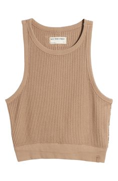 Soak in the sunshine with this waffle-stitch tank cut in a cropped length that's a great complement to high-rise styles. 19" length (size Small) Crewneck 100% cotton with 96% cotton, 4% elastane contrast Machine wash, dry flat Imported Textured Cropped Crop Top For Spring, Textured Cropped Top For Spring, Waffle Stitch, High Rise Style, Crop Tank Top, The Sunshine, Cropped Tank Top, Crop Tank, Free People