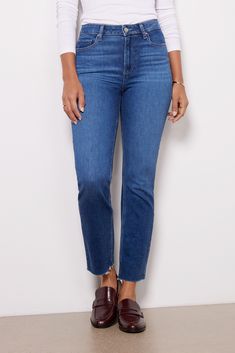 With a classic straight leg and versatile blue wash, you'll be wearing these Paige jeans on repeat. The Cindy is crafted in soft stretch denim and features a flattering high rise and raw cut hems. Everyday Cropped Jeans With Frayed Hem, Dark Wash Straight Hem Cropped Jeans, Dark Wash Cropped Jeans With Straight Hem, Dark Wash Straight Leg Jeans With Frayed Hem, Classic Cropped Leg Jeans With Frayed Hem, Classic Jeans With Frayed Hem And Cropped Leg, Classic Straight Cropped Jeans With Frayed Hem, Everyday Jeans With Frayed Straight Hem, Everyday Jeans With Frayed Hem