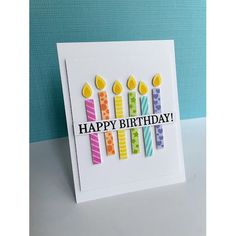 a birthday card with candles on it