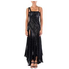 This dress is tagged size 42, however the fit is very small. We recommend size 4 our smaller. 2000S Atelier Versace Gianni Black Silk Chiffon Haute Couture Crystal Beaded Gown Embellished With Metal Mesh Dresses 1980s, Textured Fabric Dress, Versace Atelier, Kiss Dress, Tea Gown, Dresses 1950s, Versace Dress, Floral Slip Dress, Atelier Versace