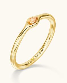 Crafted in 14K Solid Gold with an exquisite orange diamond, this ring is both classic and timeless. The diamond is set in marquise shaped gold Orange Diamond Ring As Gift, Orange Diamond Ring As A Gift, Elegant Orange Sapphire Ring For Wedding, Elegant Orange Sapphire Wedding Ring, Elegant Orange Diamond Ring With Gemstone, Elegant Orange Solitaire Rings, Elegant Orange Sapphire Ring For Anniversary, Orange Diamond Rings With Prong Setting, Orange Diamond Ring With Prong Setting