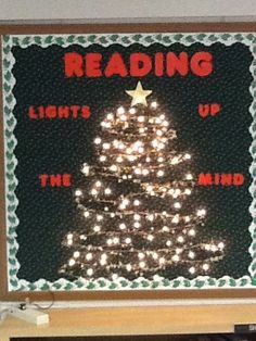 a lighted christmas tree with the words reading lights up the mind