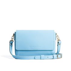 Glacial Blue*Mini | Small Leather Crossbody Bag with Magnetic Messenger Bag Closure Everyday Blue Flap Bag With Adjustable Strap, Classic Blue Flap Bag For Everyday, Blue Flap Bag With Adjustable Strap For Travel, Blue Flap Bag With Detachable Strap For Everyday, Everyday Blue Crossbody Flap Bag, Everyday Blue Bags With Magnetic Closure, Blue Shoulder Bag With Magnetic Closure For Travel, Blue Leather Bag, Portland Leather Goods