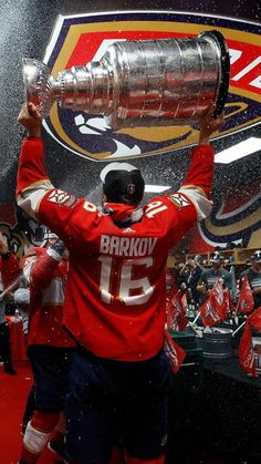 NHL hockey wallpaper background aesthetic of Florida Panthers star Sasha Barkov holding the Stanley Cup Goalie Wallpaper, Hockey Iphone Wallpaper, Ice Hockey Aesthetic Wallpaper, Nhl Aesthetic Wallpaper, Best Hockey Wallpaper, Florida Panthers Aesthetic, Nhl Backgrounds, Penguins Hockey Wallpaper, Florida Panthers Wallpaper