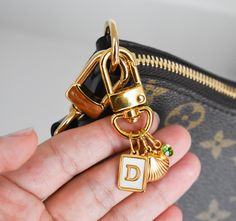 Key Chain Bag Charms Holder Birthstone Initial Zodiac Charms Holder Ring Luxury Gold Bag Charm Key Holders Purse Charm Women Bag Accessories Gift for Her For Silver Style: 👉for more charm styles check the following link. 🔆 CHAINS AND CHARMS ALL GOLD OVER STAINLESS STEEL. All Waterproof Tarnish Free OTHER DETAILS ---------------------- * WaterProof, Durable and long-lasting material, perfect for daily wear or special occasion * Hypoallergenic and Lead, cadmium, and nickel free 👌Gold filled ove Gold Bags With Logo Charm, Charms Keychain, Elegant Gift Wrapping, Keychain Holder, Ring Luxury, Key Holders, Charm Holder, Gold Bag, Bag Charms