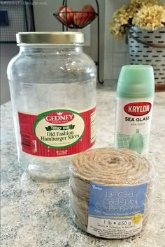 the supplies needed to make homemade hair products are displayed in front of a glass jar