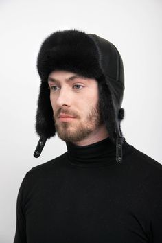 This Men's Black Mink Trapper Hat is made from Real Mink with Best Quality Tuscan Leather.  Look great with this stylish Trapper Hat.  The long ear flaps, classic style, and warm Mink furs make this hat perfect for those cold winter months.  The ear flaps can be worn down for extra warmth and style or neatly folded up and tied at the top or back.  The inside is fully lined for extra comfort. Fur Trapper, Fur Trapper Hat, Trapper Hat, Trapper Hats, Fur Hat, Mink Fur, Winter Months, Fox Fur, Groomsman Gifts