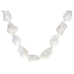 Experience the allure of timeless elegance with this Chinese Freshwater White Fancy Freeform Pearl Necklace. This exquisite piece features an array of lustrous white pearls, each uniquely shaped in a freeform style, capturing the beauty and spontaneity of nature. Measuring 32" long, the necklace is designed to drape gracefully, enhancing any outfit with its sophisticated charm. The 18k yellow gold clasp adds a touch of luxury, ensuring that this pearl necklace is as secure as it is stunning. Thi 32 Necklace, Heart Beat, Freshwater Pearl Necklace, Creating Jewelry, White Freshwater Pearl, Rope Necklace, Freshwater Pearl Necklaces, Classic Beauty, Pearl White