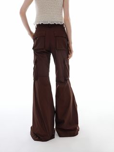 MO&Co. Women's Cargo Style Flared Pants These pants are crafted from lightweight, comfortable material with a crinkled texture. The classic elements of cargo cut and flared hem bring a touch of the 1970s hippie trend. Perfect for everyday wear occasions. Pair with our matching top or jacket for an effortlessly cool look. Features : - Flared leg in cargo style- Wide pockets on the sides- Zip and button closure- Crinkled texture, lightweight fabric Code: MBD1PAT029The back length of size M is 110c Brown Cargo Style Wide-leg Pants, Brown Wide-leg Parachute Pants With Cargo Pockets, Brown Wide-leg Cargo Pants, Fitted Wide-leg Parachute Pants With Cargo Pockets, Brown Wide-leg Cargo Pants For Spring, Brown Flared Cotton Pants, Flared Cargo Pants, Style Flared Pants, Flare Cargo Pants