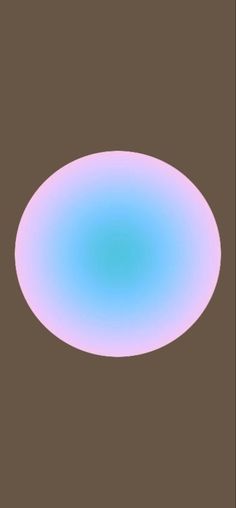 a blue and pink circular object on a brown background