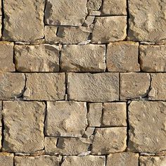 a stone wall made out of small rocks, with no mortars or stones on it