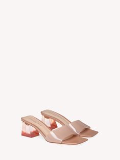 Buy COSMIC for USD 895.00 | Gianvito Rossi United States Evening Mules With Contrasting Heel Counter And Square Toe, Designer Mules With Block Heel And Deep Heel Cup, Designer Summer Mules With Block Heel, Designer Block Heel Mules For Summer, Luxury Summer Block Heels With Sculpted Heel, Trendy Square Toe Evening Mules, Modern Mules With Reinforced Heel And Square Toe, Modern Mules With Square Toe And Reinforced Heel, Designer Square Toe Summer Mules