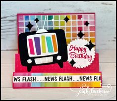 a card with a tv on it and happy birthday written across the front in rainbow colors