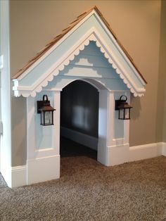 a dog house with two lights on each side