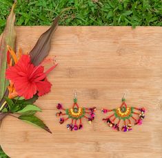 Kalbeliya Gypsy Tribal Necklaces- Mirabelle Handmade Kalbeliya earrings with sterling silver posts in glorious color combos of beaded work and tassels. These bold beauties mimic the flamboyancy of the Kalbeliya tribal people. Each pair is made by a woman, a dancer from the tribe, named Moriya. She makes each piece with love and an eagerness to demonstrate a taste of her culture. Kalbeliya tribe people are known for snake charming and trading snake venom. They are also called Saperas or Snake Cha Traditional Beaded Chandelier Earrings For Celebrations, Traditional Beaded Tassel Dangle Earrings, Traditional Beaded Dangle Earrings With Tassels, Traditional Beaded Chandelier Earrings For Festive Occasions, Multicolor Bohemian Beaded Earrings For Celebration, Traditional Multicolor Fair Trade Earrings, Traditional Multicolor Beaded Earrings With Tassels, Traditional Multicolor Tassel Jewelry, Bohemian Beaded Earrings With Latkans