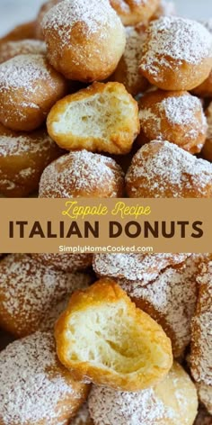 italian donuts with powdered sugar are piled on top of each other in a pile