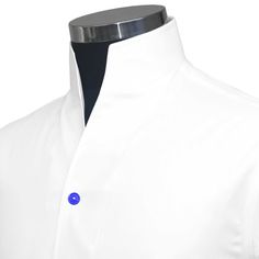 "Men's High Open V Collar Plain White 100% Cotton Long Sleeves Dress Shirt In Multi Color Buttons, Cotrast Buttons, Rainbow Buttons MADE-TO-ORDER CLOTHES Shirt Style: Karl Lagerfeld Style/ High Chinese Mandarin Collar/ High Open V Collar Collar Style: 3\" High Stiff Buttonless Collar Pockets: Without pocket (Chest pocket can be added on request) Fabric: 100% Giza cotton soft & comfortable fabric Sleeves: Full Sleeves/ Long Sleeves Fine stitched (20-21 stitches per inch) Cleanly finished button holes Flat Felled Seams Hand cut and sewed individually High-quality tailoring Savile Row / British style collar Cuff: 4\" wide single cuff, with 3 buttons These shirts are made with a single cuff. For the double cuff, please leave us a message. * The shirts are made on order in our family-run worksh White Formal Shirt With Stand Collar, Formal White Shirt With Stand Collar, Classic White Shirt With Stand Collar, Fitted Shirt With Stand Collar And Button Closure, Fitted White Dress Shirt With Buttons, White Fitted Dress Shirt With Buttons, Semi-formal Fitted Top With Stand Collar, Classic Shirt With Stand Collar And Buttons, White Stand Collar Shirt With Button Closure