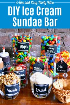 an ice cream sundae bar with lots of candy