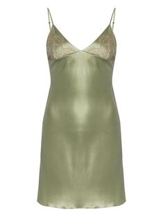 light green/beige silk satin V-neck Chantilly lace adjustable spaghetti straps slip silhouette curved hem thigh-length We've partnered with Good On You — an independent agency that rates how brands perform in relation to their impact on the planet, people and animals, with a multi-criteria rating simplified to a five points scale. In order to be awarded our conscious label, larger brands need to score a minimum of four out of five ('Good'), while smaller brands must score at least three out of f Little Green Dress, Light Green Outfit, Satin Dress Aesthetic, Light Green Mini Dress, Satin Green Dress, 20s Inspired Dress, Green Slip Dress, Scrub Corpo, Green Cocktail Dress