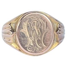 This sweet signet is modelled in 9ct rose gold. The colour of the ring is very soft rose gold. The initials read 'J B W' and can be read in any order. On the back of the face there is an inscription that reads 'W.J.W 2nd July 1916'. Ring Size: O or 7 1/4 Face Diameter: 14x11.5mm Weight: 3.9g Formal Hallmarked Rose Gold Engraved Ring, Formal Rose Gold Engraved Ring Hallmarked, Formal Rose Gold Engraved Ring With Hallmark, Hallmarked Oval Initial Ring In Rose Gold, Victorian Rose Gold Signet Ring For Anniversary, Victorian Rose Gold Signet Ring As Gift, Antique Rose Gold Signet Ring For Formal Occasions, Victorian Rose Gold Signet Ring For Gift, Victorian Hallmarked Rose Gold Signet Ring