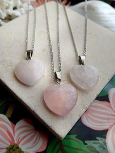 A genuine polished rose quartz heart - shaped crystal is strung on your choice of chain. This healing crystal makes a great gift for all those working on their heart chakra and is a sweet addition to anyones necklace arsenal. Metaphysical Properties:Rose quartz is known as a healing crystal and the stone of unconditional love. It's believed by some to emit strong vibrations of love, which are thought to: support emotional and relationship healing. inspire compassion. boost feelings of peace and Relationship Healing, Healing Stones Necklace, Rose Quartz Heart, Necklace Crystal, Heart Chakra, Healing Crystal, Healing Stones, Stone Necklace, Heart Necklace